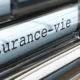 Onglets de classeurs métalliques étiquetés « Famille » et « Assurance-vie »